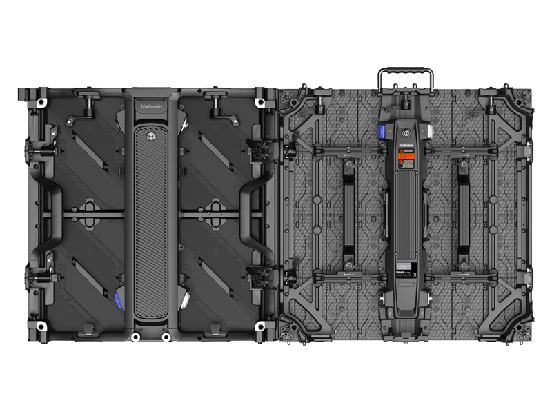 Top-down view of two rugged black transport cases for the Unilumin URMIII 2.6 MK2 Pro Flex XS LED Wall module (2.6mm), one case open and one closed; both cases have handles, secure latches, wheels for mobility, and durable textured surfaces designed to protect LED wall modules during transport.