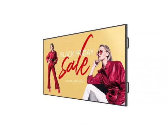 LG 110UM5K-B 110-inch UHD Signage Display showing two women in red outfits and sunglasses with Black Friday sale, 20% off everything on a bold yellow background. Perfect for retail digital advertising and store promotions.