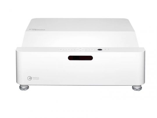 Front view of a white Optoma projector with rounded edges, minimal top buttons, and four small feet for tabletop placement; sleek and modern home or office projection device.