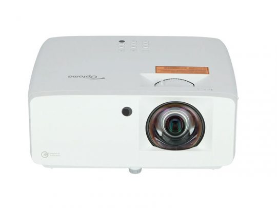 White Optoma projector viewed from above, displaying its lens on the left, a round sensor beside it, three circular control buttons arranged in a row, and a label with product information. This home or office projector features a sleek design suitable for presentations and entertainment.